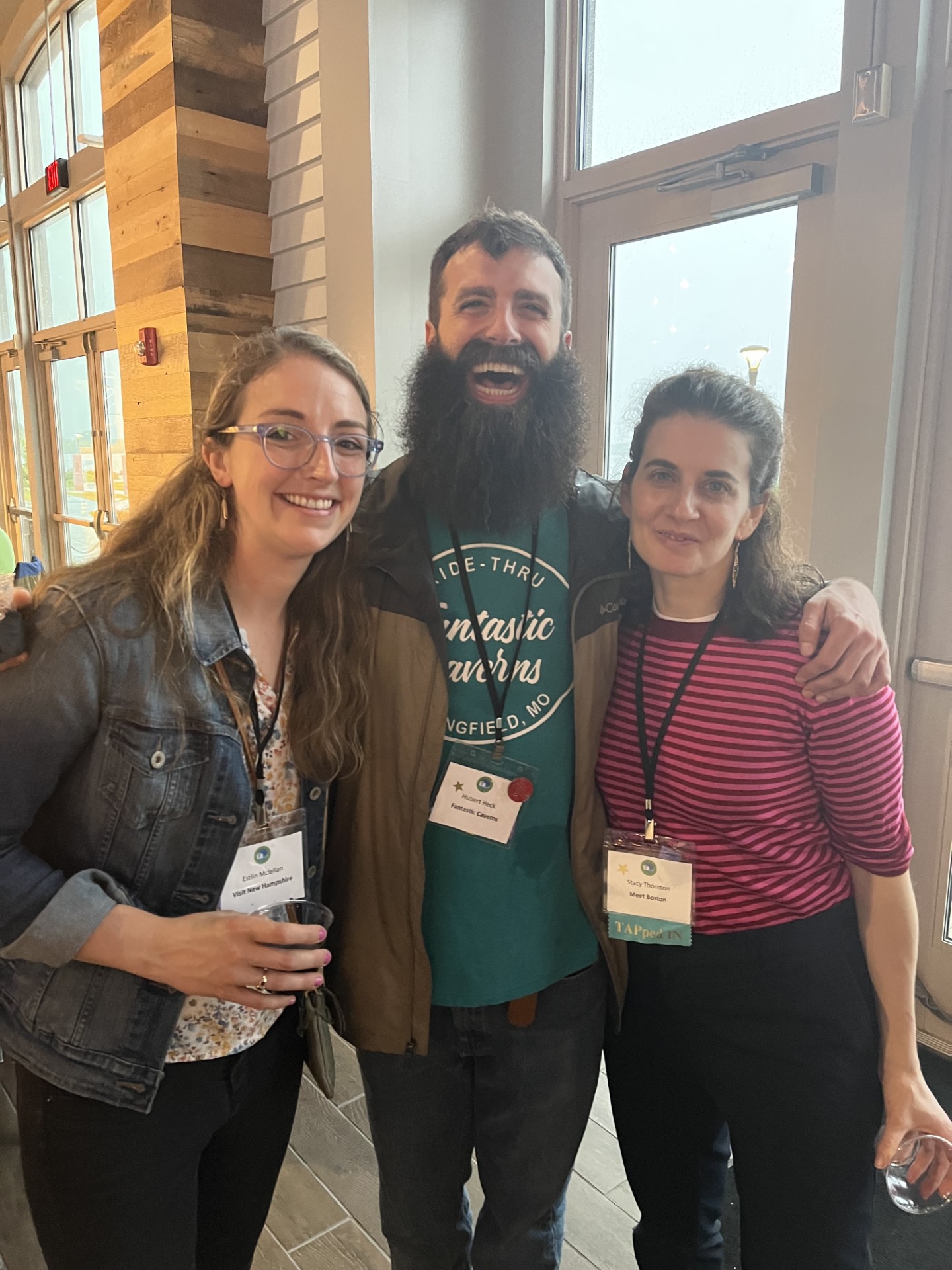 three people smile for a photo at TAP Dance